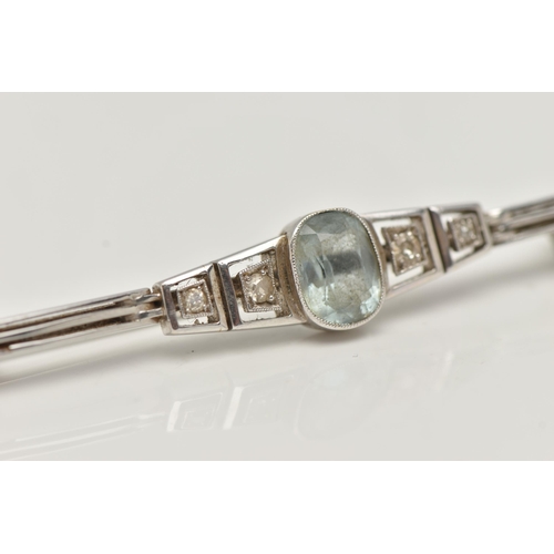 114 - AN ART DECO WHITE METAL AQUAMARINE AND DIAMOND BAR BROOCH, a principally set oval cut aquamarine in ... 