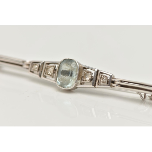 114 - AN ART DECO WHITE METAL AQUAMARINE AND DIAMOND BAR BROOCH, a principally set oval cut aquamarine in ... 