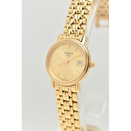 119 - A LADIES 'TISSOT' WRISTWATCH, quartz movement, gold tone round dial, signed 'Tissot 1853', baton mar... 