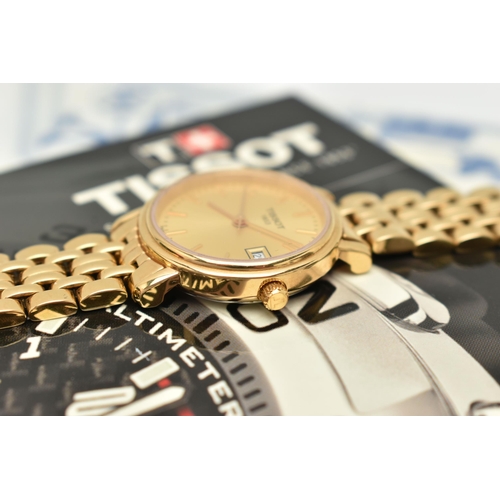 119 - A LADIES 'TISSOT' WRISTWATCH, quartz movement, gold tone round dial, signed 'Tissot 1853', baton mar... 