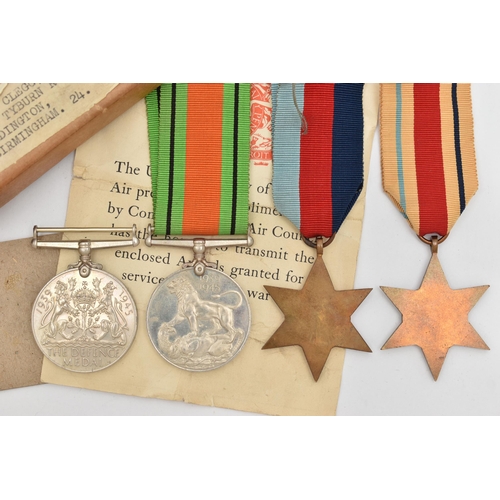 127 - A BOXED SET OF FOUR SECOND WORLD WAR MEDALS, to include a 1939-45 Battle of Britain Star, with ribbo... 