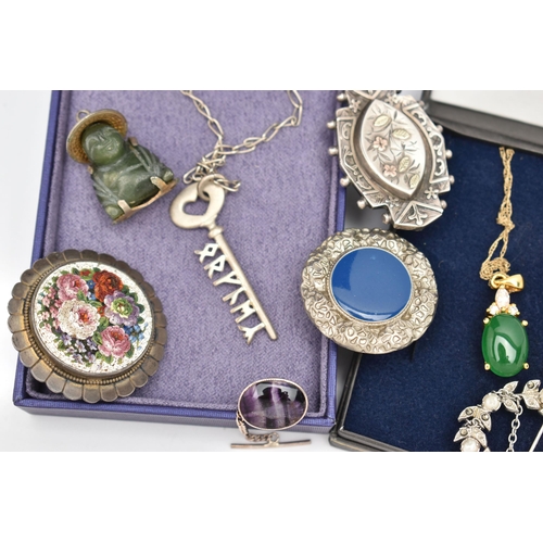 129 - A SMALL ASSORTMENT OF ITEMS, to include a boxed gold plated pendant with a yellow metal Prince of Wa... 