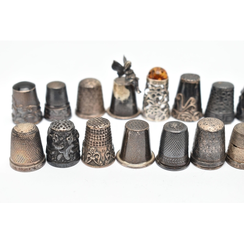 141 - A BAG OF WHITE METAL THIMBLES, various designs and patterns, some set with semi-precious stone termi... 