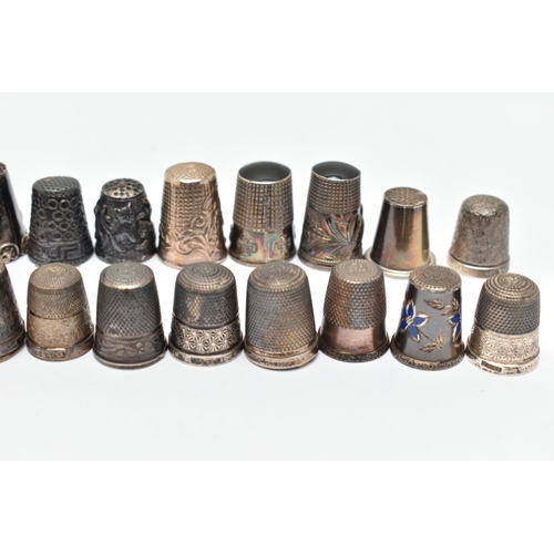 141 - A BAG OF WHITE METAL THIMBLES, various designs and patterns, some set with semi-precious stone termi... 