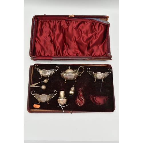 146 - AN INCOMPLETE CASED SILVER CRUET SET, including three salts, hallmarks for Chester and Birmingham, a... 