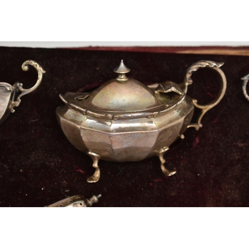 146 - AN INCOMPLETE CASED SILVER CRUET SET, including three salts, hallmarks for Chester and Birmingham, a... 