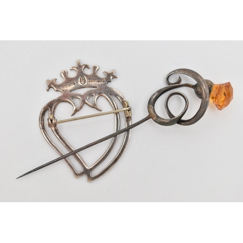 94 - A WHITE METAL MID CENTURY 'LUCKENBOOTH' BROOCH AND A 'CHARLES HORNER' HAT PIN, a double open work he... 