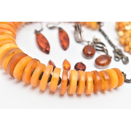 173 - AN ASSORTMENT OF AMBER JEWELLERY, to include a large statement necklace, comprised of thirty nine am... 