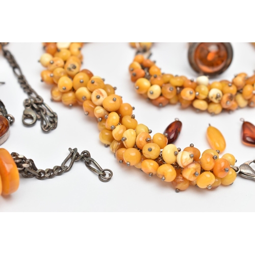 173 - AN ASSORTMENT OF AMBER JEWELLERY, to include a large statement necklace, comprised of thirty nine am... 