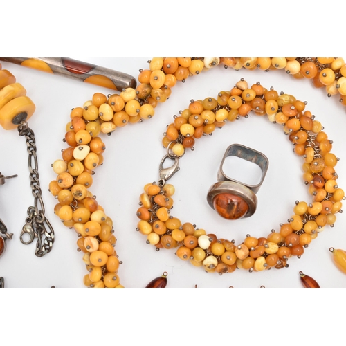 173 - AN ASSORTMENT OF AMBER JEWELLERY, to include a large statement necklace, comprised of thirty nine am... 