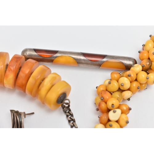 173 - AN ASSORTMENT OF AMBER JEWELLERY, to include a large statement necklace, comprised of thirty nine am... 