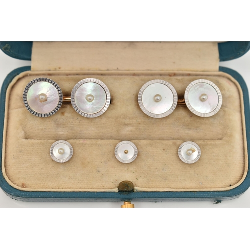 180 - A BOXED SET OF VINTAGE 'TIFFANY & CO' GENTS CUFFLINKS AND SHIRT STUDS, yellow and white metal round ... 