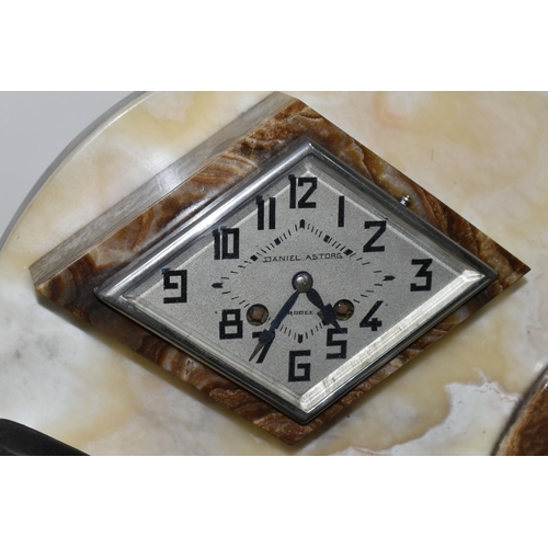 384 - A FRENCH ART DECO CLOCK, the three toned marble case of geometric form, surmounted by two cast metal... 