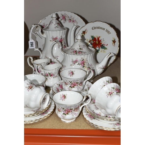 392 - A ROYAL ALBERT 'LAVENDER ROSE' PATTERN TEA SET, comprising a coffee pot, teapot, cake plate, two mil... 