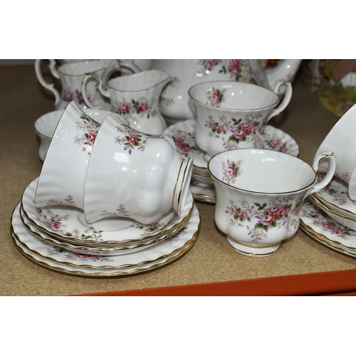 392 - A ROYAL ALBERT 'LAVENDER ROSE' PATTERN TEA SET, comprising a coffee pot, teapot, cake plate, two mil... 