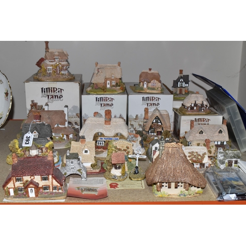 393 - A COLECTION OF LILLIPUT LANE COTTAGES, five boxed houses comprising Circular Cottage and Oak Cottage... 