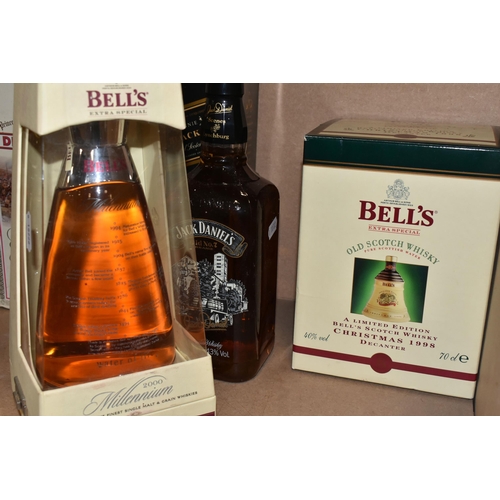 818 - FOUR BOTTLES OF WHISKY comprising one bottle of BELL'S 2000 MILLENNIUM blended Scotch Whisky, aged 8... 