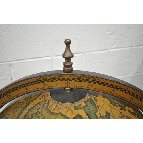 1207 - A 20TH CENTURY DRINKS GLOBE, with a hinged lid, enclosing a fitted interior, raised on spiral suppor... 