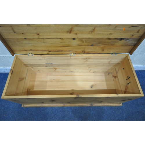 1212 - A MODERN PINE BLANKET CHEST, with a hinged lid, width 123cm x depth 46cm x height 52cm (condition re... 