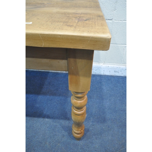 1227 - A 20TH CENTURY PINE RECTANGULAR FARMHOUSE STYLE TABLE, raised on turned legs, width 140cm x depth 88... 