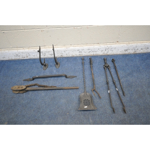 1230 - A PAIR OF VICTORIAN CAST IRON ANTI CLIMB SPIKES, a door handle, a chain pipe wrench, along with four... 