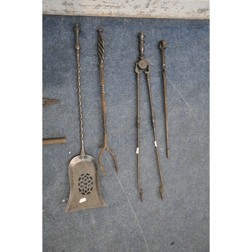 1230 - A PAIR OF VICTORIAN CAST IRON ANTI CLIMB SPIKES, a door handle, a chain pipe wrench, along with four... 