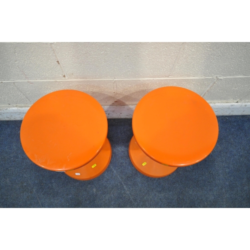 1231 - A PAIR OF DANISH ORANGE PLASTIC TAM TAM STYLE STOOLS, each stool separates in the centre, possibly f... 