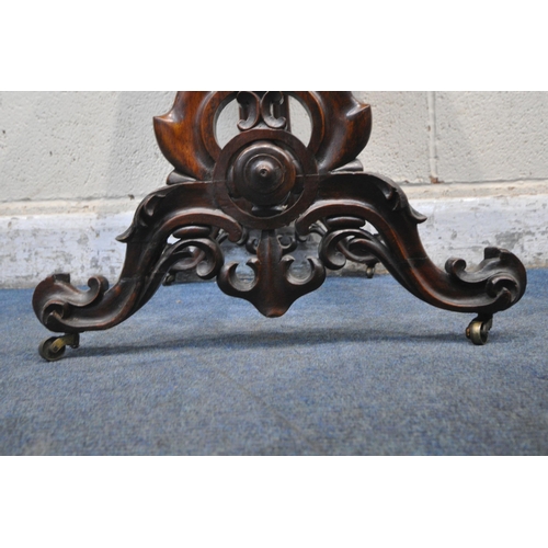 1238 - A VICTORIAN ROSEWOOD WORK TABLE, with a hinged lid, that's enclosing various divisions, raised on sc... 