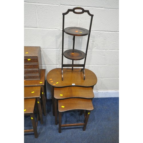 1241 - A SELECTION OF 20TH CENTURY OAK OCCASIONAL FURNITURE, to include a kidney nest of three tables, widt... 