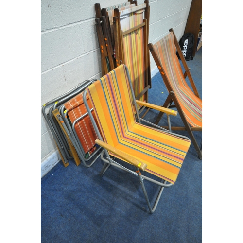 1249 - FOUR MID CENTURY FOLDING BEACH CHAIRS, with stripped fabric seats, along with a set of four folding ... 