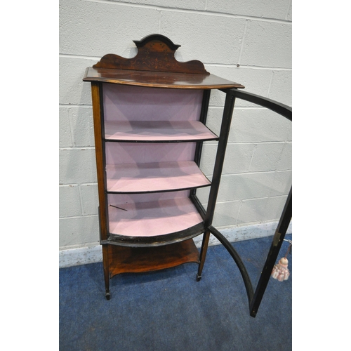 1251 - AN EDWARDIAN MAHOGANY BOW FRONT DISPLAY CABINET, with a raised back, the single door enclosing two s... 