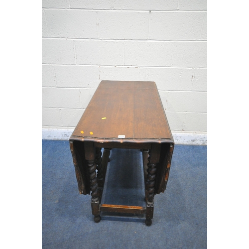 1252 - AN EARLY 20TH CENTURY OAK BARLEY TWIST GATE LEG TABLE, open width 152cm x closed width 52cm depth 10... 