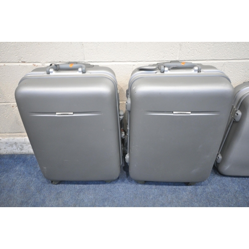 1270 - FOUR DELUXURY SILVER HARDSHELL SUITCASES (condition report: general signs of usage) (4)