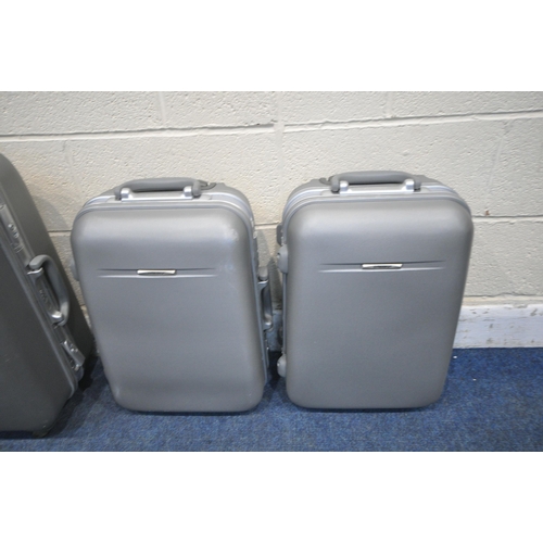 1270 - FOUR DELUXURY SILVER HARDSHELL SUITCASES (condition report: general signs of usage) (4)