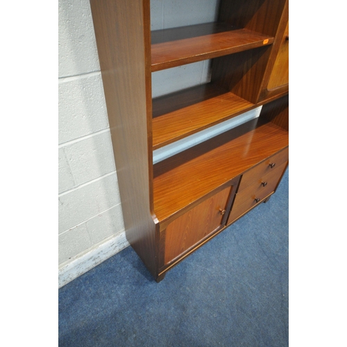 1275 - STATEROOM BY STONEHILL, A MID CENTURY TEAK BOOKCASE, with double glazed sliding doors, an arrangemen... 