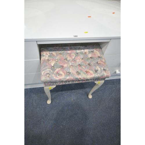 1281 - A WHITE DRESSING TABLE, with two circular mirrors and two banks of three drawers, length 146cm x dep... 