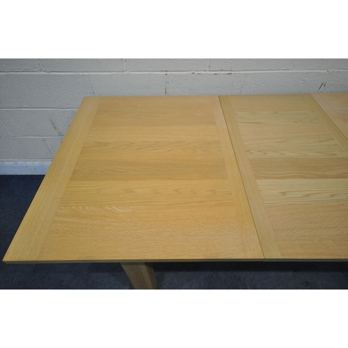 1282 - A LIGHT OAK RECTANGULAR EXTENDING DINING TABLE, with one additional leaf, extended length 200cm x cl... 