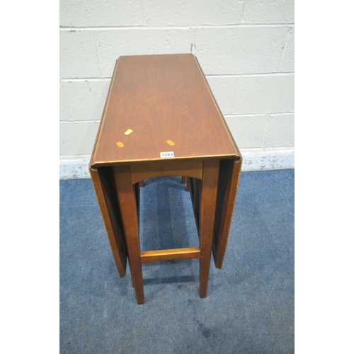 1283 - A MID CENTURY TEAK DROP LEAF DINING TABLE, open width 138cm x closed width 37cm x depth 83cm x heigh... 