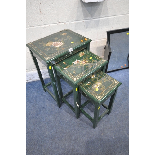 1289 - A GREEN LACQUERED NEST OF THREE TABLES, with floral patterns, smallest table with a single drawer, l... 