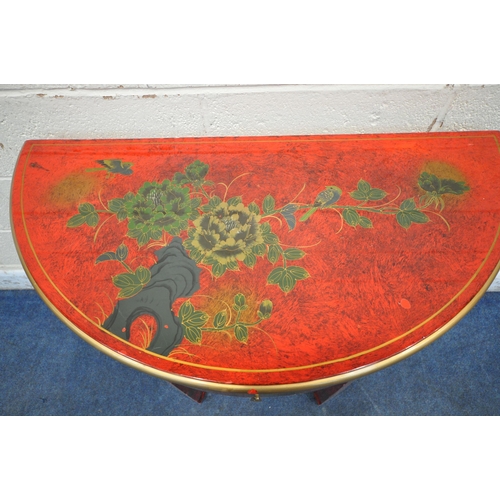 1290 - A RED LACQUERED CHINESE DEMI-LUNE SIDE TABLE, with floral chinoiserie decoration, a single frieze dr... 