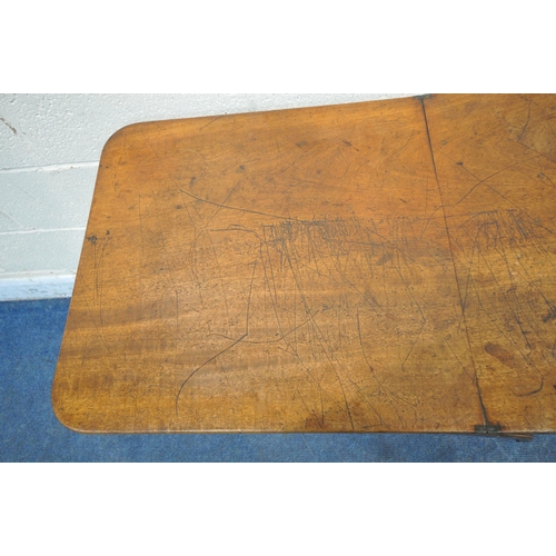 1298 - AN EARLY VICTORIAN MAHOGANY FOLDING CAMPAIGN COACHING TABLE, with a rectangular top, raised on a cro... 