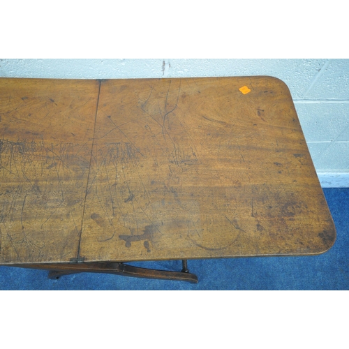 1298 - AN EARLY VICTORIAN MAHOGANY FOLDING CAMPAIGN COACHING TABLE, with a rectangular top, raised on a cro... 