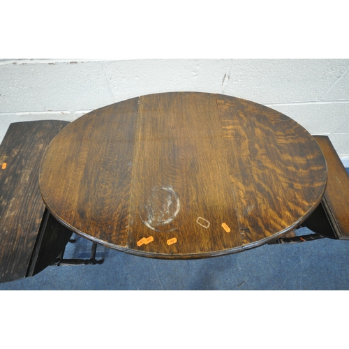 1301 - THREE EARLY 20TH CENTURY OAK DROP LEAF TABLES, the largest raised on barley twist supports, the othe... 