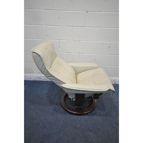 1306 - AN EKORNES STRESSLESS CREAM LEATHER RECLINING ARMCHAIR, with a matching footstool (condition report:... 