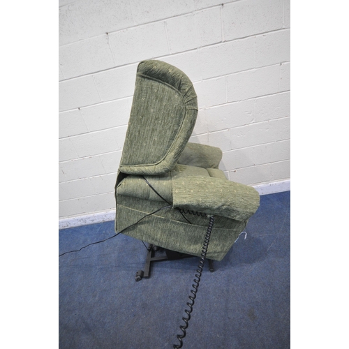 1307 - A GREEN UPHOLSTERED RISE AND RECLINE ARMCHAIR, width 90cm x depth 88cm x height 103cm (condition rep... 