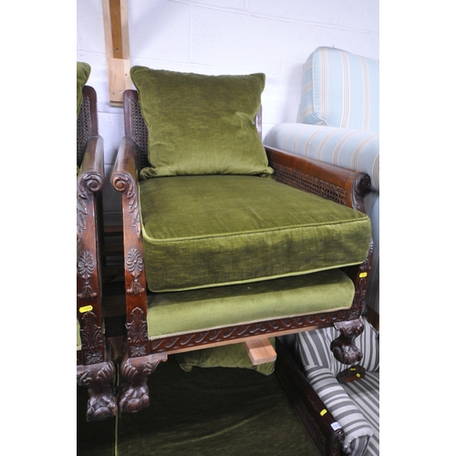 1315 - AN EARLY 20TH CENTURY MAHOGANY THREE PIECE LOUNGE SUITE, comprising a two seater sofa, with green up... 