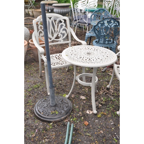 1008 - A CAST ALUMINIUM GARDEN TABLE 61cm in diameter,  two matching chairs and parasol base (4)