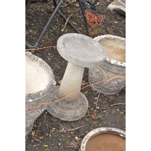 1016 - TWO MODERN COMPOSITE GARDEN POTS both 56cm in diameter and a bird bath with tapered base and square ... 