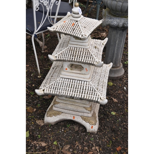 1019 - A MODERN COMPOSITE PAGODA GARDEN STRUCTURE in four parts height 97cm