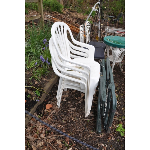 1021 - FOUR WHITE PLASTIC GARDEN CHAIRS and two metal folding chair frames (6)